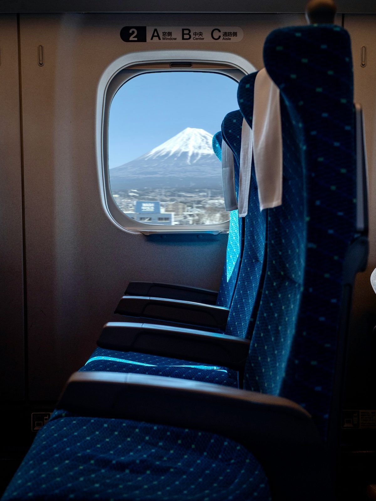 Mount Fuji through a shinkansen window